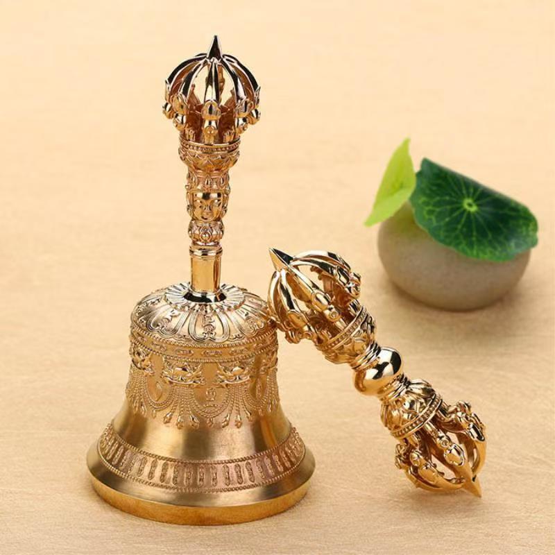 Brass Nine-Prong Vajra with Bell, handcrafted to embody Tibetan Buddhist ritual culture. A beautiful and powerful artifact to enhance spiritual practices and decor.