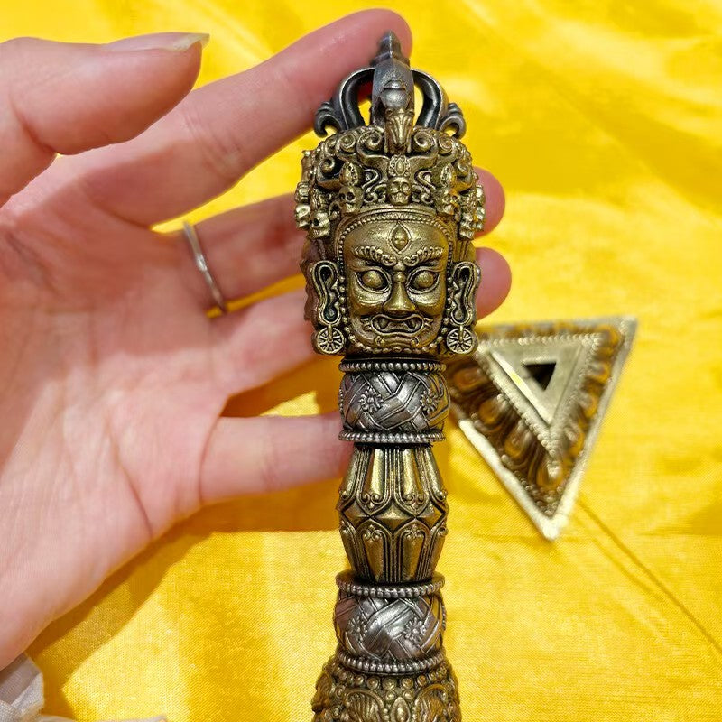 Handmade brass Phurba Vajra with stand from Tibetan Buddhist ritual implements culture, a tantric ritual implement representing spiritual power and protection in Buddhist ritual implements art.