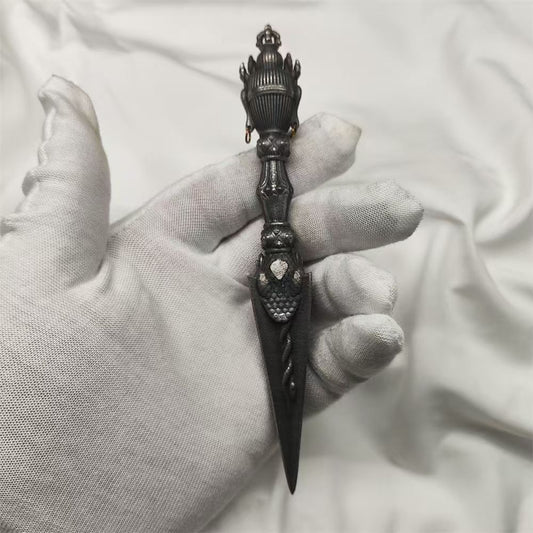 Handmade brass Vajra Phurba inspired by Tibetan Buddhist ritual implements culture, representing spiritual protection and traditional Buddhist ritual art.