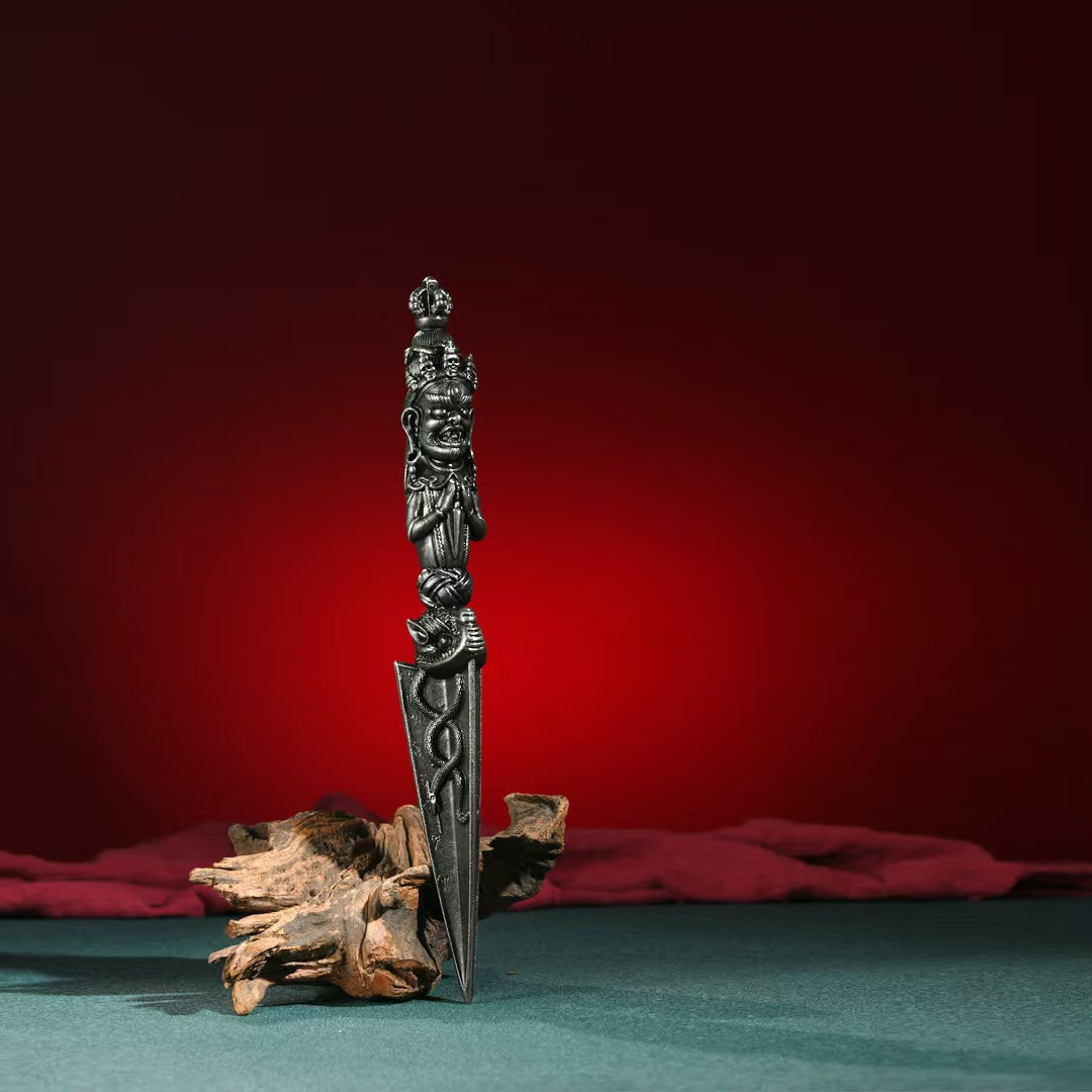 A handcrafted Phurba Vajra designed to dispel evil and purify negative energy. Perfect for Tibetan Buddhist altars, it represents protection, wisdom, and the power to overcome obstacles.