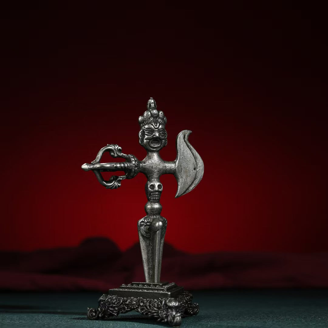 Brass Five-Pronged Phurba and Crossed Vajra Axe, representing wisdom, protection, and spiritual blessings. Perfect for Tibetan Buddhist altars and sacred spaces.