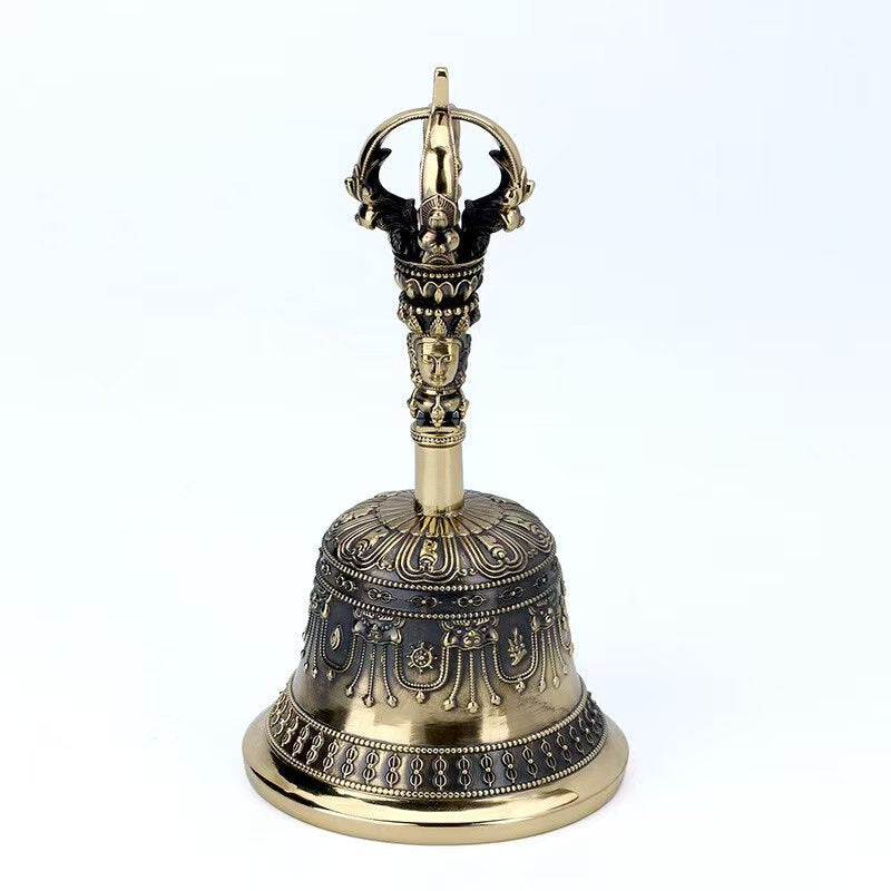 This handcrafted Brass Nine-Pronged Vajra Bell features nine bells and is inspired by Tibetan Buddhist ritual implements culture. Its design symbolizes the protection from evil and spiritual safeguarding. Perfect for Buddhist ceremonies and as a unique decorative piece.