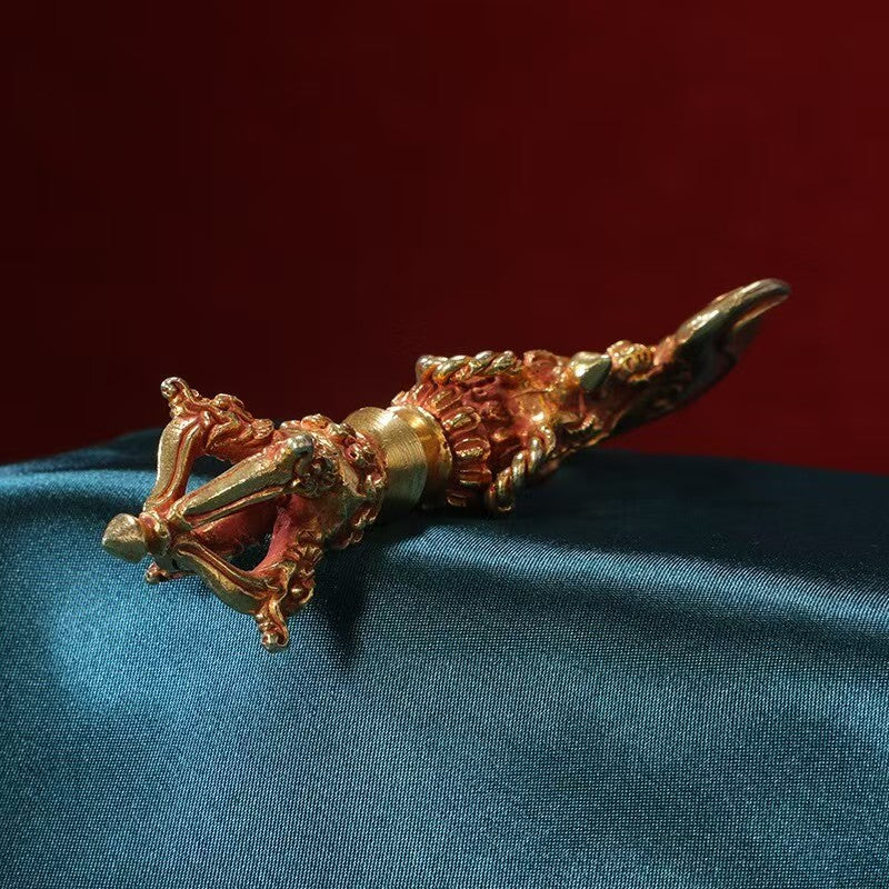 Handcrafted brass Vajra handle featuring a dragon head, symbolizing strength, protection, and spiritual power. A stunning piece of Tibetan Buddhist art, perfect for rituals, meditation, and enhancing your spiritual practice.