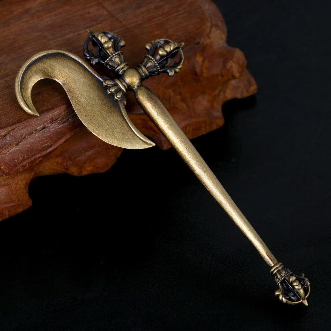 This handcrafted brass Vajra hook offers powerful spiritual protection and is perfect for Tibetan Buddhist rituals and meditation. A beautiful piece of ritual art.