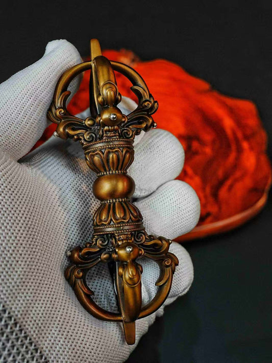 Brass Vajra, handcrafted with intricate detail, symbolizing wisdom, protection, and spiritual strength in Tibetan Buddhism. Ideal for rituals, meditation, and enhancing spiritual environments.