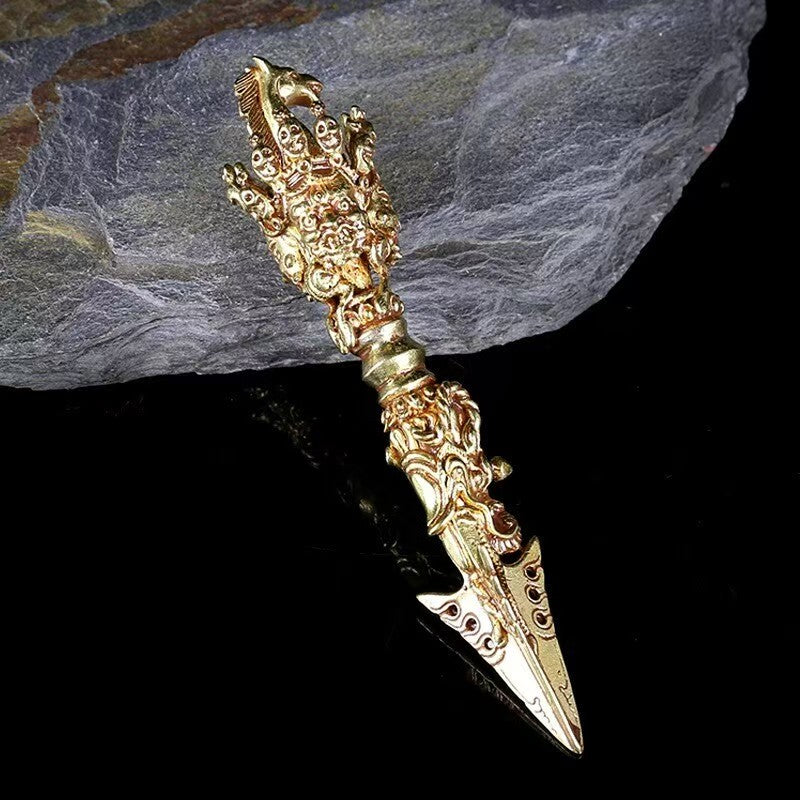 Handcrafted brass Vajra featuring Mahakala design, representing divine protection and strength. A unique spiritual tool that adds cultural and spiritual value to your collection or ritual space.