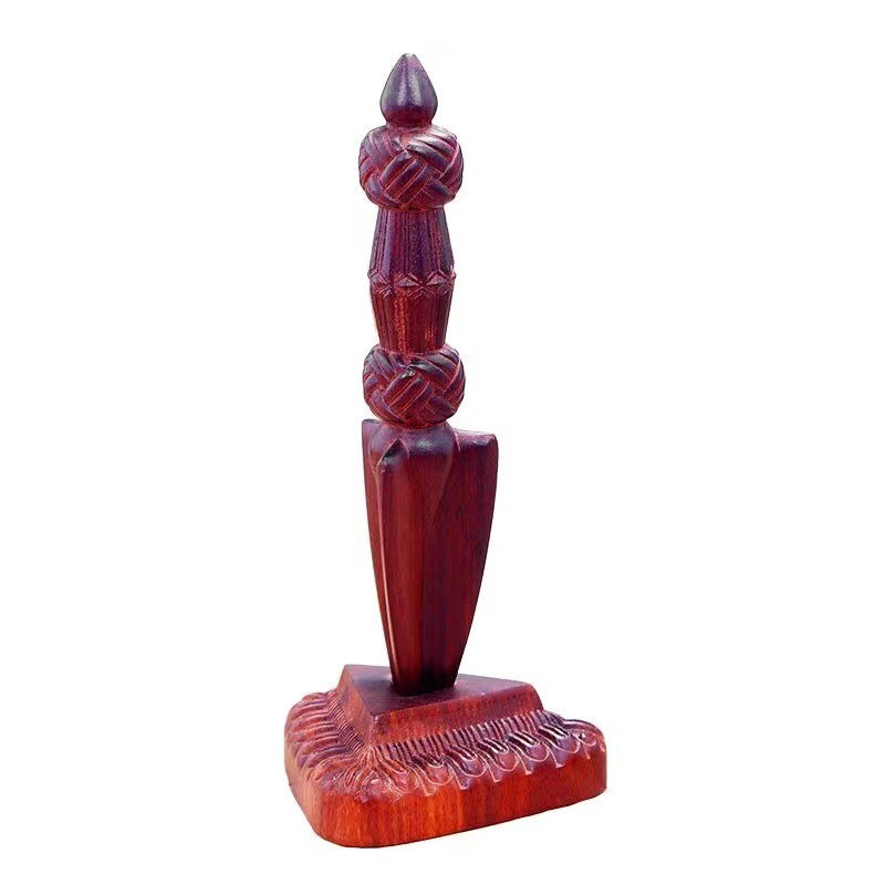 Brass and African red sandalwood Phurba, representing spiritual purification and protection. This handcrafted piece, complete with a wooden base, enhances any Tibetan Buddhist altar, ritual space, or home decor.