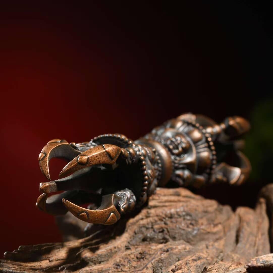 Handmade brass Phurba Vajra representing Tibetan Buddhist ritual implements art and esoteric spiritual practice.