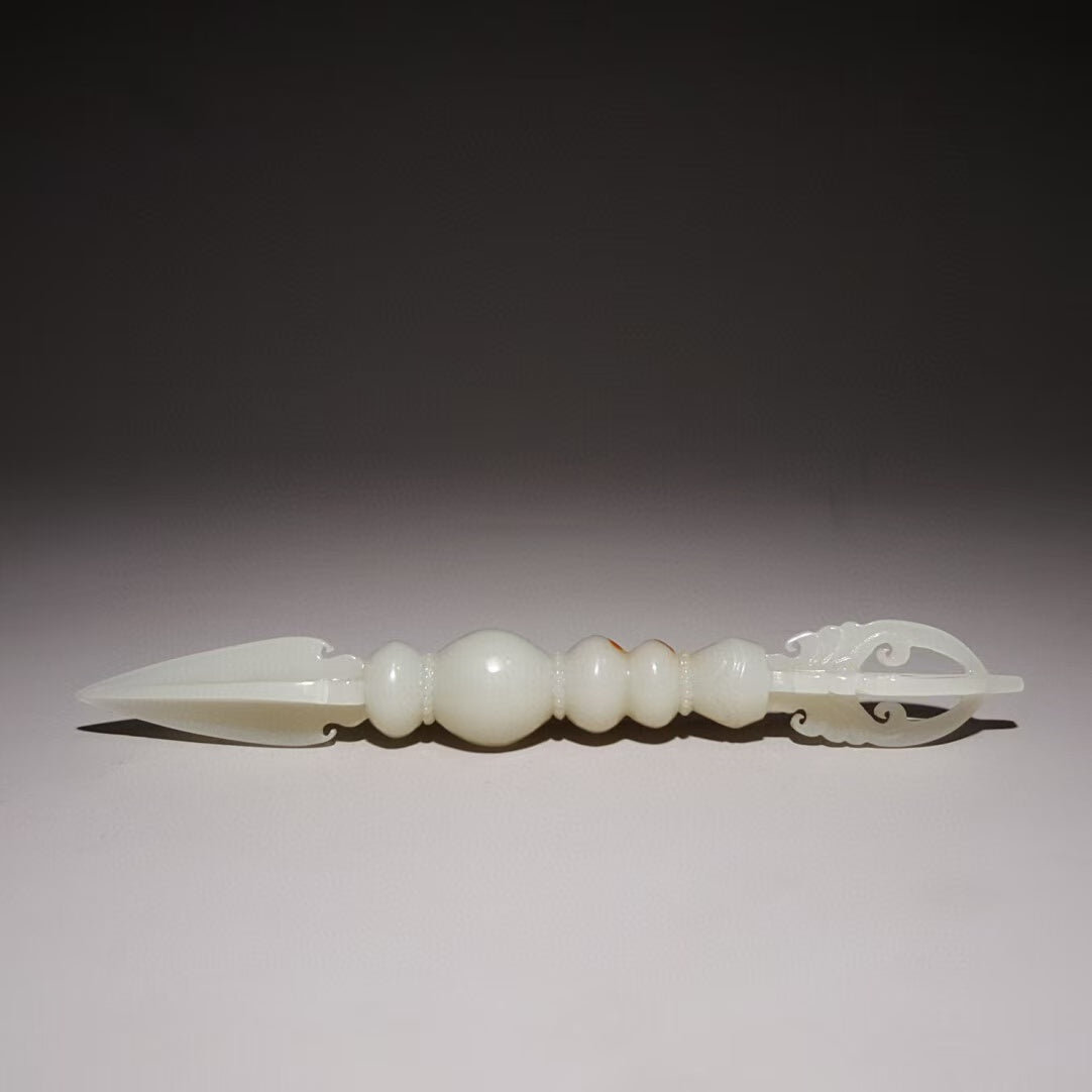 A pure handcrafted Hetian Jade Vajra, representing the union of wisdom and compassion in Tibetan Buddhism. Perfect for spiritual rituals and as an art piece in your sacred space.
