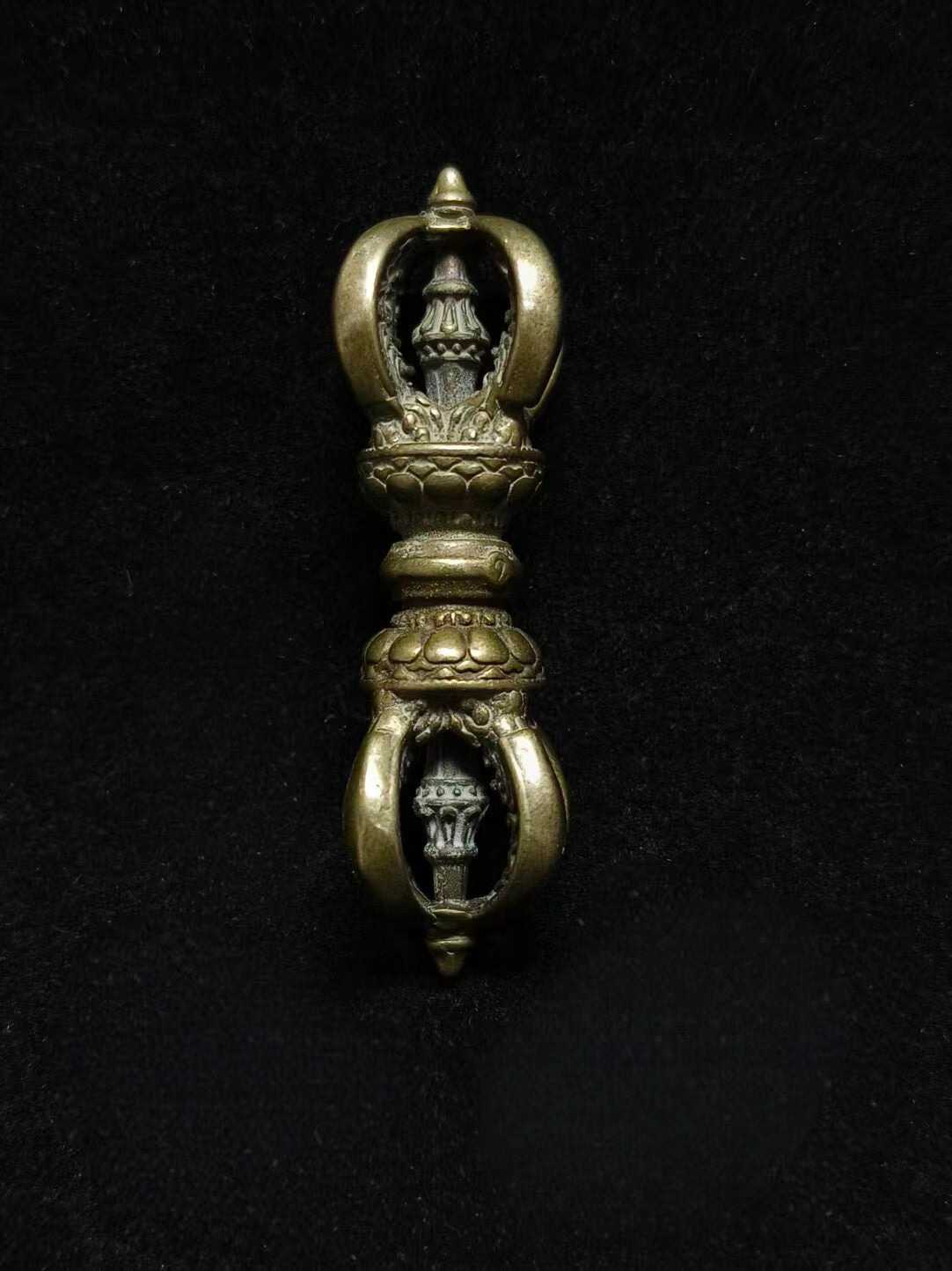 Mastercrafted brass Five-Pronged Vajra, symbolizing spiritual energy, protection, and wisdom. A sacred ritual art piece, perfect for Tibetan Buddhist altars and spiritual practices.