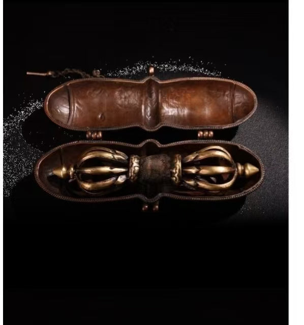 Experience the power and symbolism of this copper nine-pronged Vajra handcrafted in Nepal. This antique brass Phurba dagger is a sacred Tibetan Buddhist ritual tool used for protection, purification, and spiritual enlightenment. It is perfect for meditation, rituals, and adding a unique spiritual artifact to your collection. Enhance your Buddhist altar or sacred space with this authentic handcrafted ritual tool.
