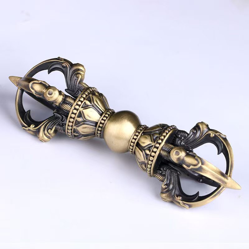 Handcrafted Brass Bell featuring a Five-Pronged Vajra, a Tibetan Buddhist ritual tool. Perfect for purification, spiritual practices, and creating a sacred space