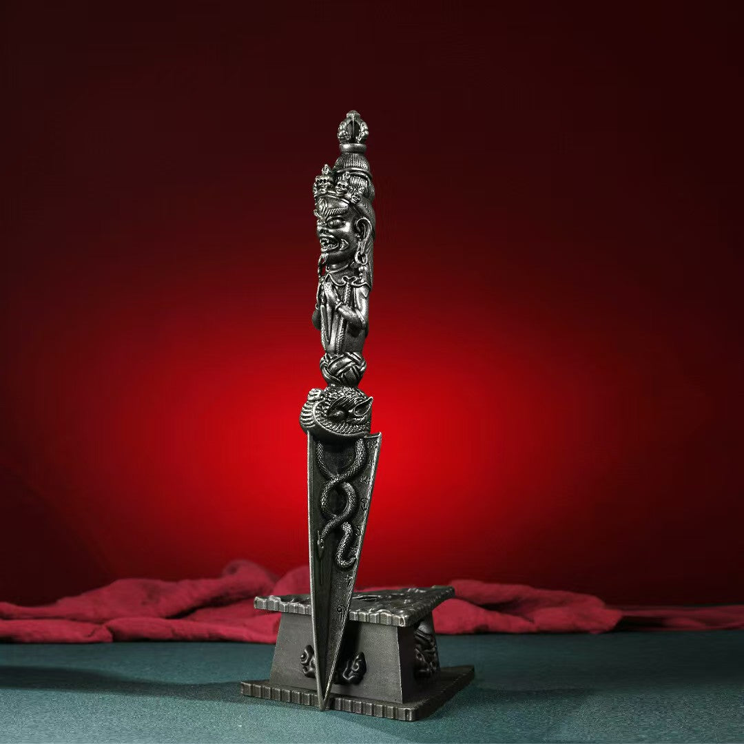 A sacred and powerful Tibetan ritual tool, this brass Phurba Vajra combines ancient relics to protect, purify, and bring spiritual strength to your home or altar.