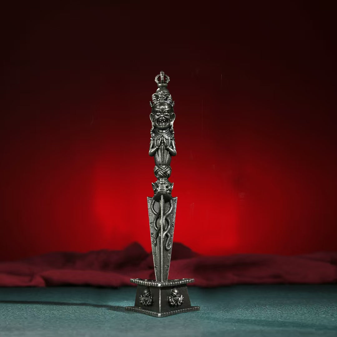 This Phurba Vajra is handcrafted with precision and combines Tibetan Buddhist symbolism, perfect for spiritual purification and protection during rituals and meditation.