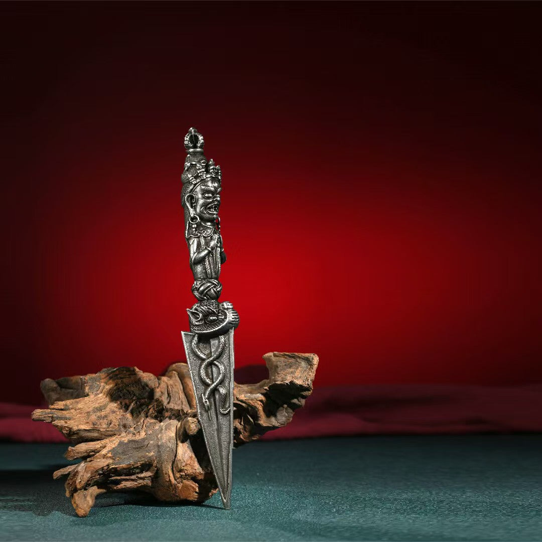 A powerful brass Phurba Vajra that represents the conquest of negative energies. Ideal for enhancing your meditation space, this sacred ritual tool embodies wisdom and spiritual growth.