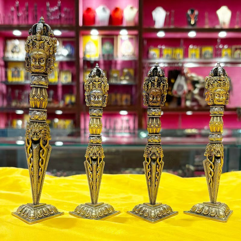 Tibetan tantric brass Phurba Vajra ritual object rooted in Tibetan Buddhist ritual implements culture, symbolizing protection, stability, and sacred craftsmanship in Buddhist ritual implements art.
