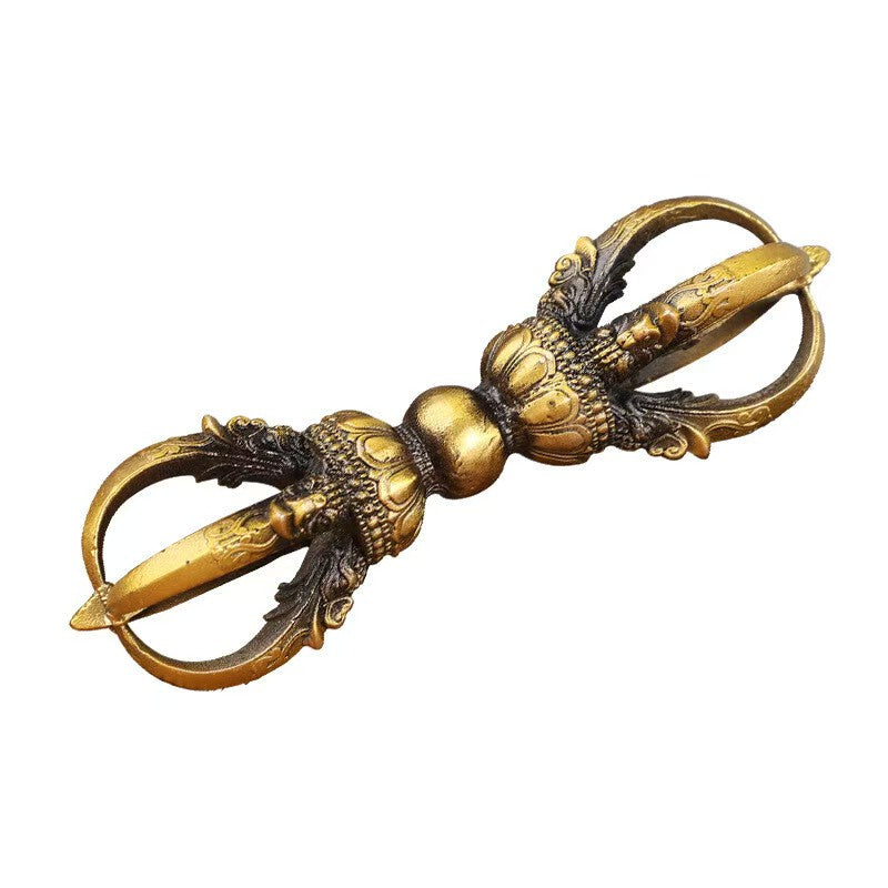 Handcrafted brass five-pronged vajra, inspired by Tibetan Buddhist ritual implements culture, symbolizing protection and spiritual power in Buddhist ritual implements art.