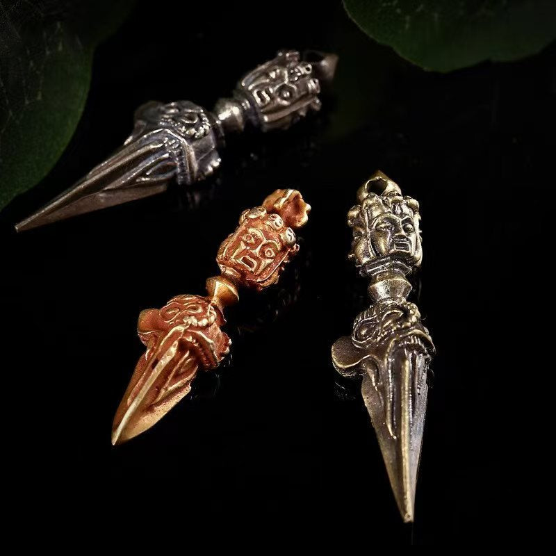 Brass three-sided Phurba with horse head Vajra dagger, handcrafted according to Tibetan Buddhist ritual implements culture, showcasing traditional Buddhist ritual implements art.