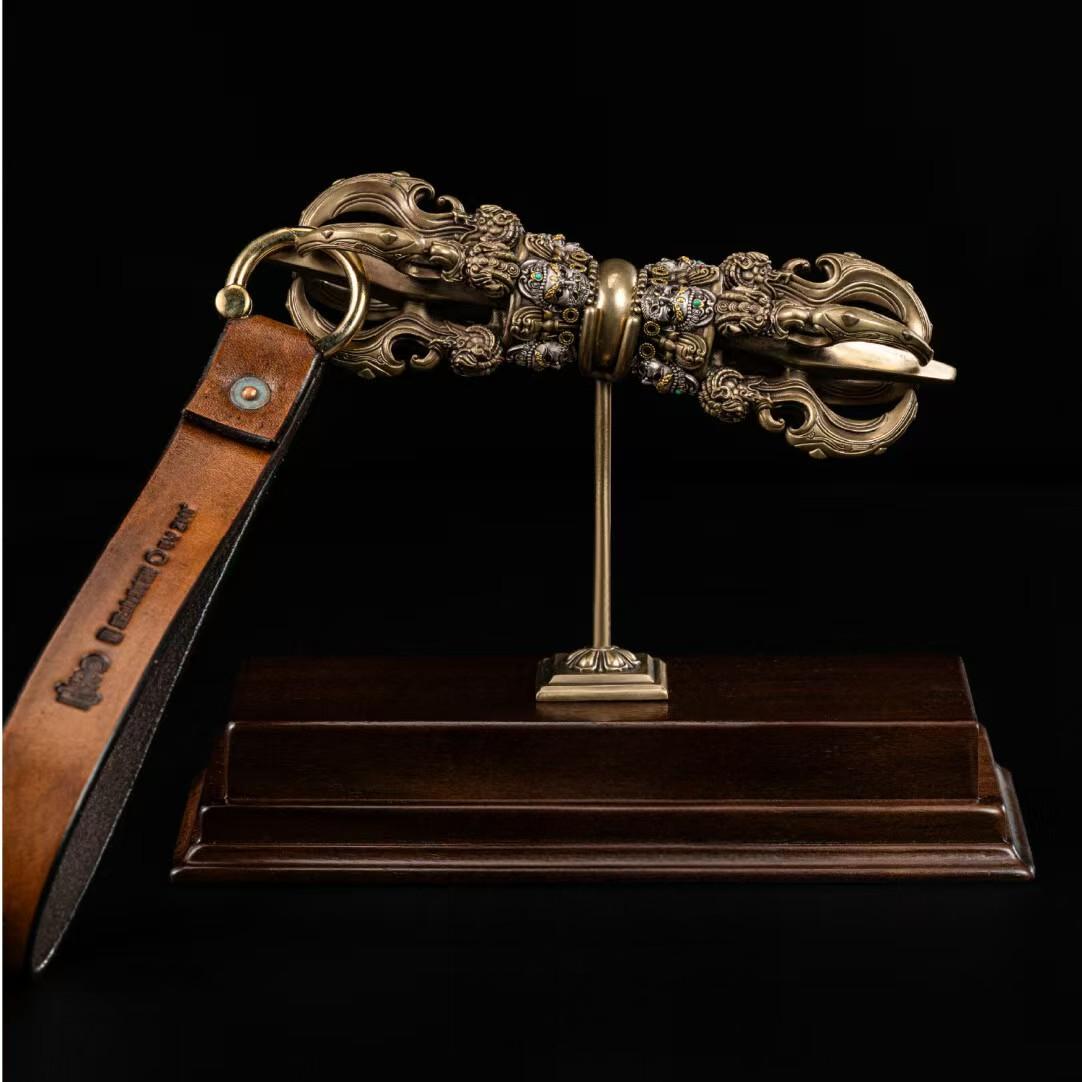 Handcrafted brass Para Vajra ornament, inspired by Tibetan Buddhist ritual implements culture, showcasing traditional Buddhist ritual implements art.