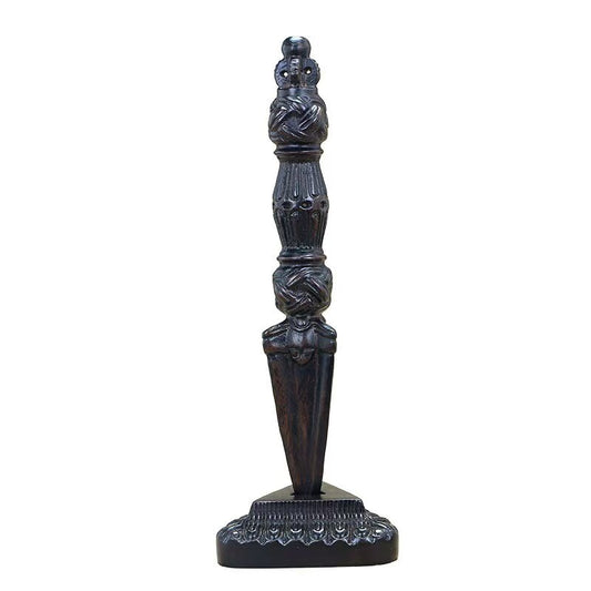 Handcrafted brass Phurba Vajra with wooden base, inspired by Tibetan Buddhist ritual implements culture, showcasing traditional Buddhist ritual implements art.