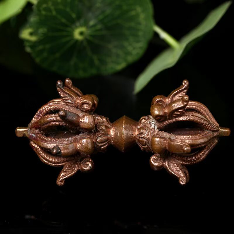 Brass nine-pronged Vajra dagger, handmade in Tibetan Buddhist ritual implements culture style, reflecting authentic Buddhist ritual implements art.