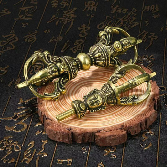 Handcrafted brass vajra representing rich Tibetan Buddhist ritual implements culture, symbolic of spiritual power, perfect for meditation and Buddhist ritual implements art.