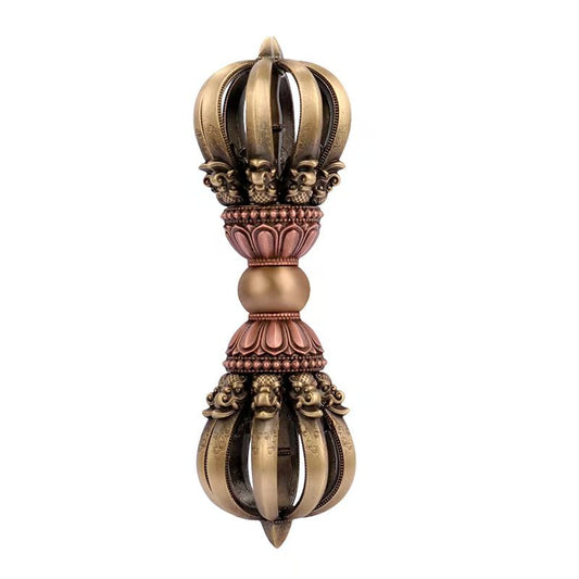 Traditional brass vajra handle representing Tibetan Buddhist ritual implements culture, a powerful symbol of spiritual protection and wisdom in Buddhist ritual implements art.