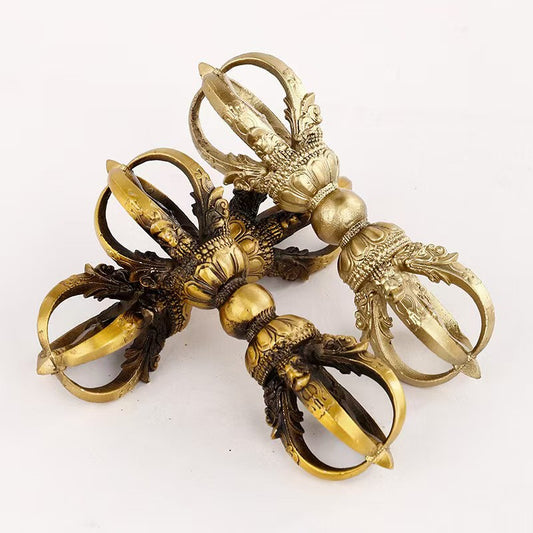 Handmade brass vajra representing Tibetan Buddhist ritual implements culture, symbolic Buddhist ritual implements art for meditation and protection