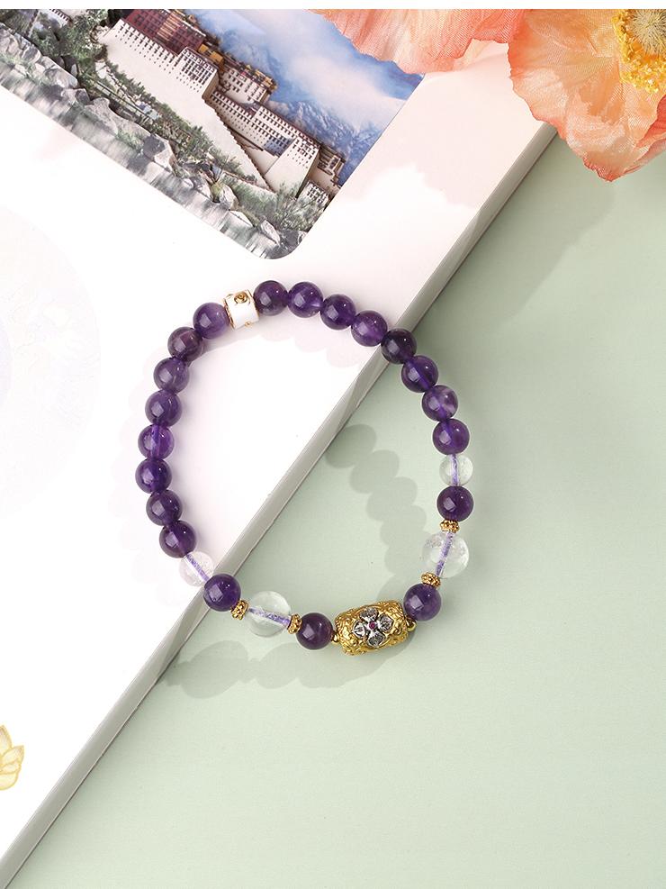 Handmade Amethyst & Clear Quartz bracelet inspired by Tibetan Buddhist jewelry culture. Crafted with traditional techniques, this jewelry art piece promotes spiritual well-being and healing.