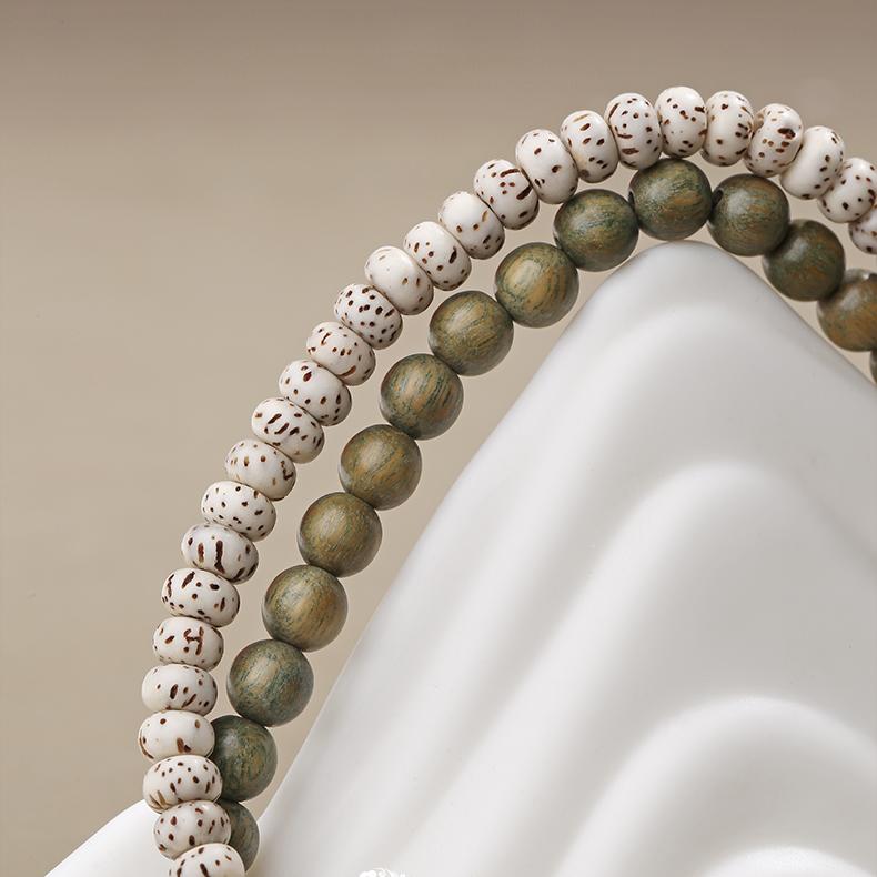 This artisan-crafted bracelet made with green sandalwood and star moon bodhi beads reflects the rich traditions of Tibetan Buddhist jewelry culture. A beautiful piece for collectors, spiritual seekers, and mindful practitioners.