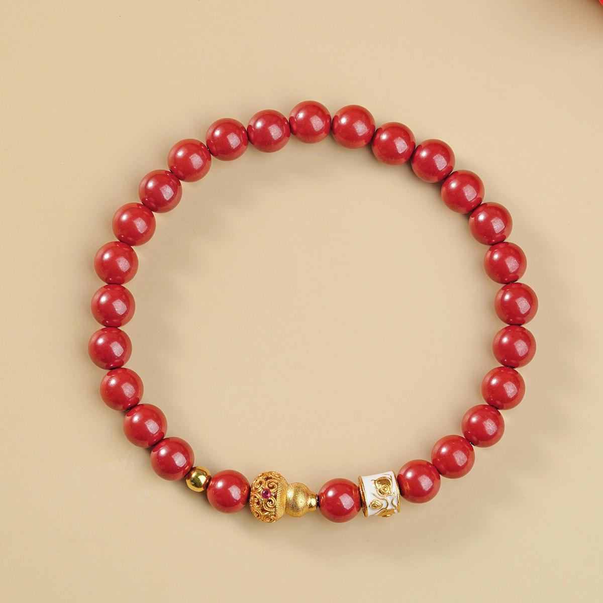 Handmade Tibetan Buddhist cinnabar bracelet featuring hand-painted beads, showcasing traditional Tibetan Buddhist jewelry culture and jewelry art.