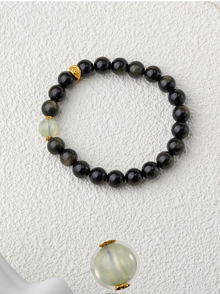 Hand-painted with care, this goldstone and peridot bracelet promotes positive energy and spiritual well-being. A beautiful piece of Tibetan jewelry art for daily wear.