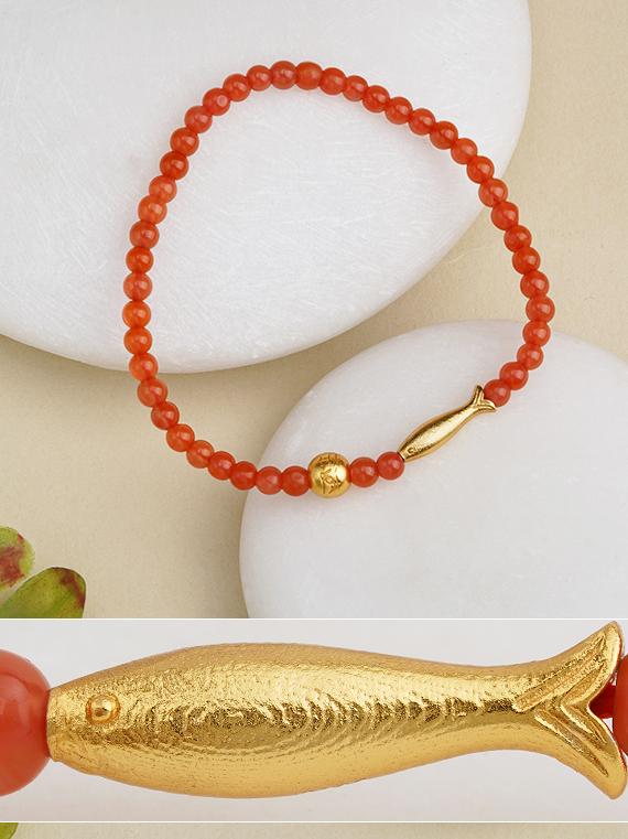 This hand-painted red agate bracelet is crafted with Tibetan artistry, symbolizing healing, prosperity, and positive energy to support your spiritual journey.