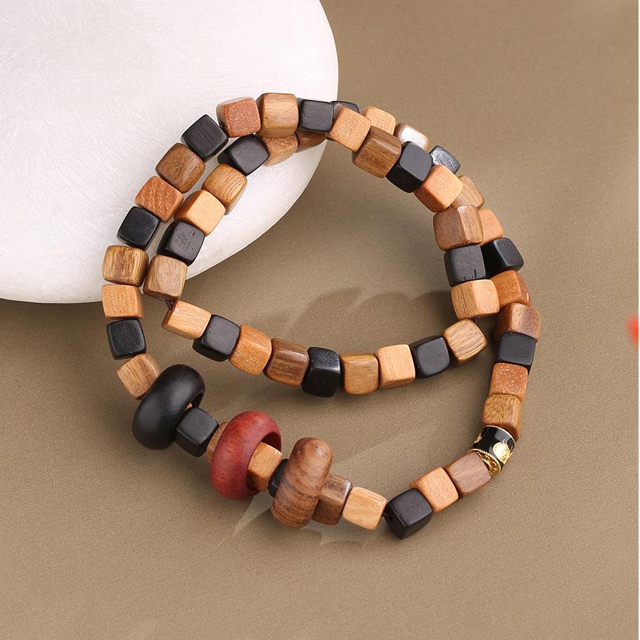 Hand-painted Tibetan Buddhist sandalwood beaded wrap bracelet designed for peace, mindfulness, and inner strength. A meaningful Jewelry Art creation for meditation.