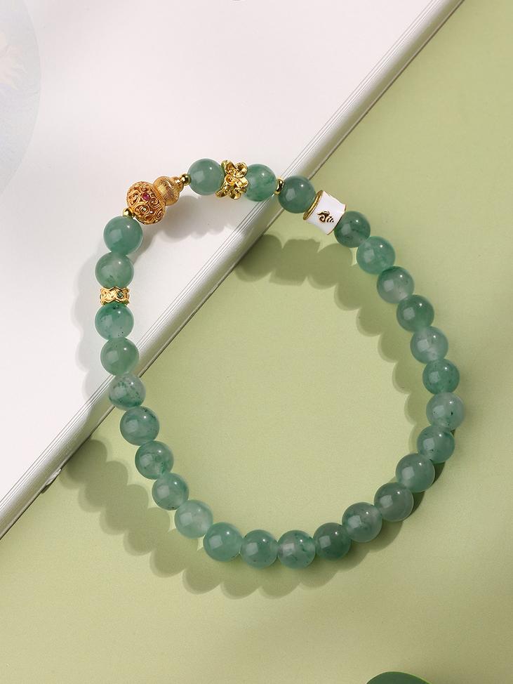 This handmade African jade bracelet promotes spiritual balance and harmony. Crafted with care, it blends Tibetan jewelry art with healing energy, perfect for daily wear.