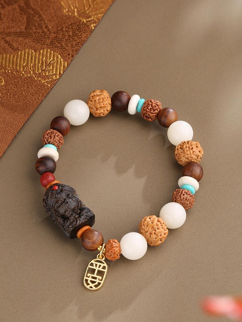 Handcrafted Tibetan Buddhist Bodhi and Rosewood bracelet symbolizing protection and wisdom, pure handmade and hand-painted jewelry art for meditation and daily wear.