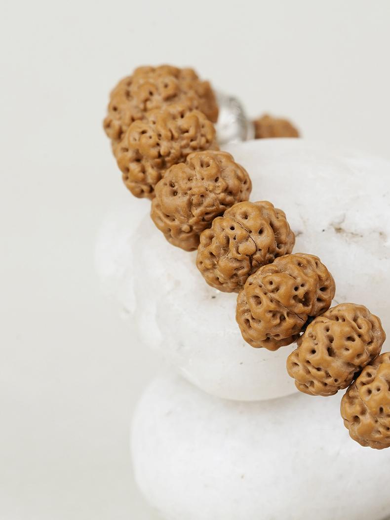 Handcrafted Bodhi, Silver & Agate Tiger Tooth Dzi Bead Bracelet – Symbol of Protection and Strength in Tibetan Buddhist Jewelry.