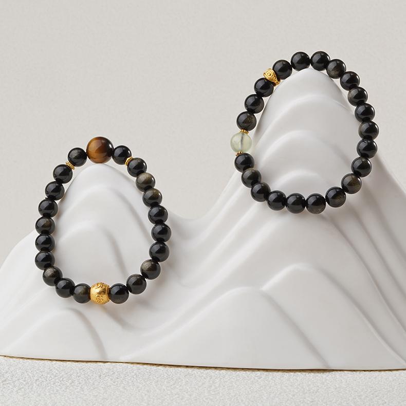 This handmade goldstone and tiger eye bracelet is designed to provide spiritual protection and enhance personal strength. A perfect addition to your sacred jewelry collection.