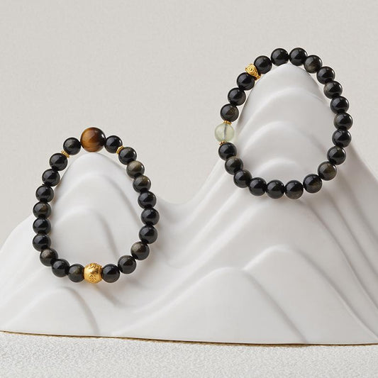 This handmade goldstone and tiger eye bracelet is designed to provide spiritual protection and enhance personal strength. A perfect addition to your sacred jewelry collection.