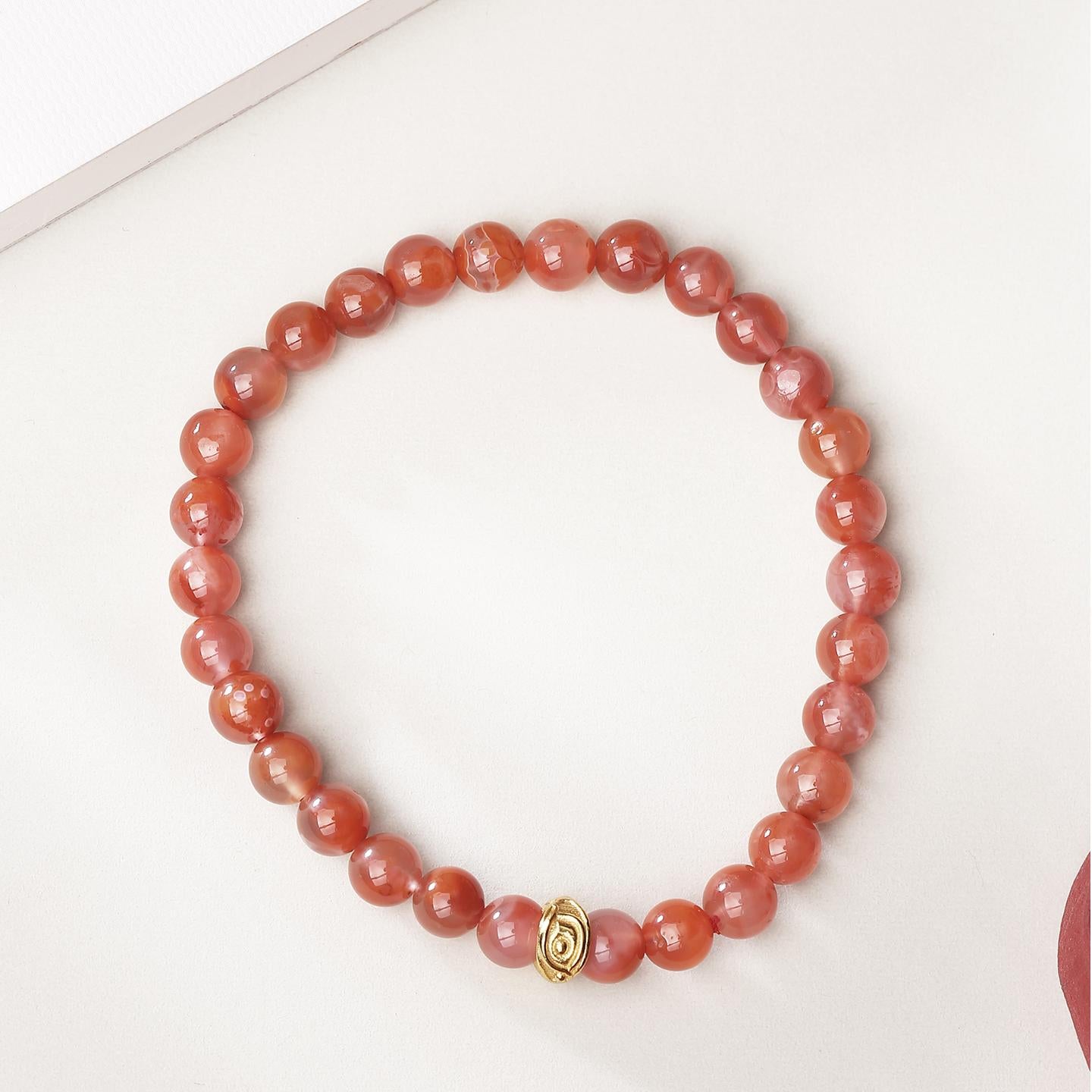 This handmade red agate bracelet is designed with the Eye of Wisdom, symbolizing clarity, insight, and spiritual growth. Perfect for those seeking protection and balance.
