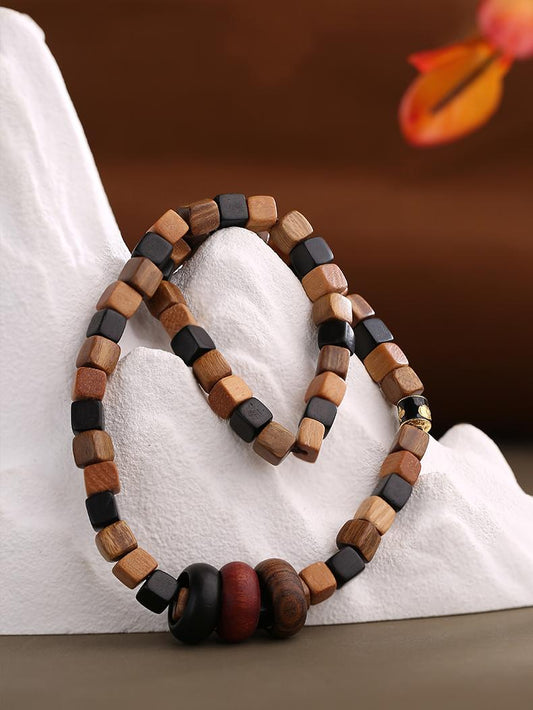 Handcrafted Tibetan Buddhist sandalwood multi-layer bracelet symbolizing peace and wisdom. A pure Jewelry Art piece made for meditation and spiritual harmony.