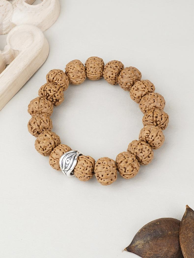 Handcrafted Silver and Bodhi Bead Bracelet featuring Wisdom Eye Mantra Design – Tibetan Buddhist Jewelry Art.