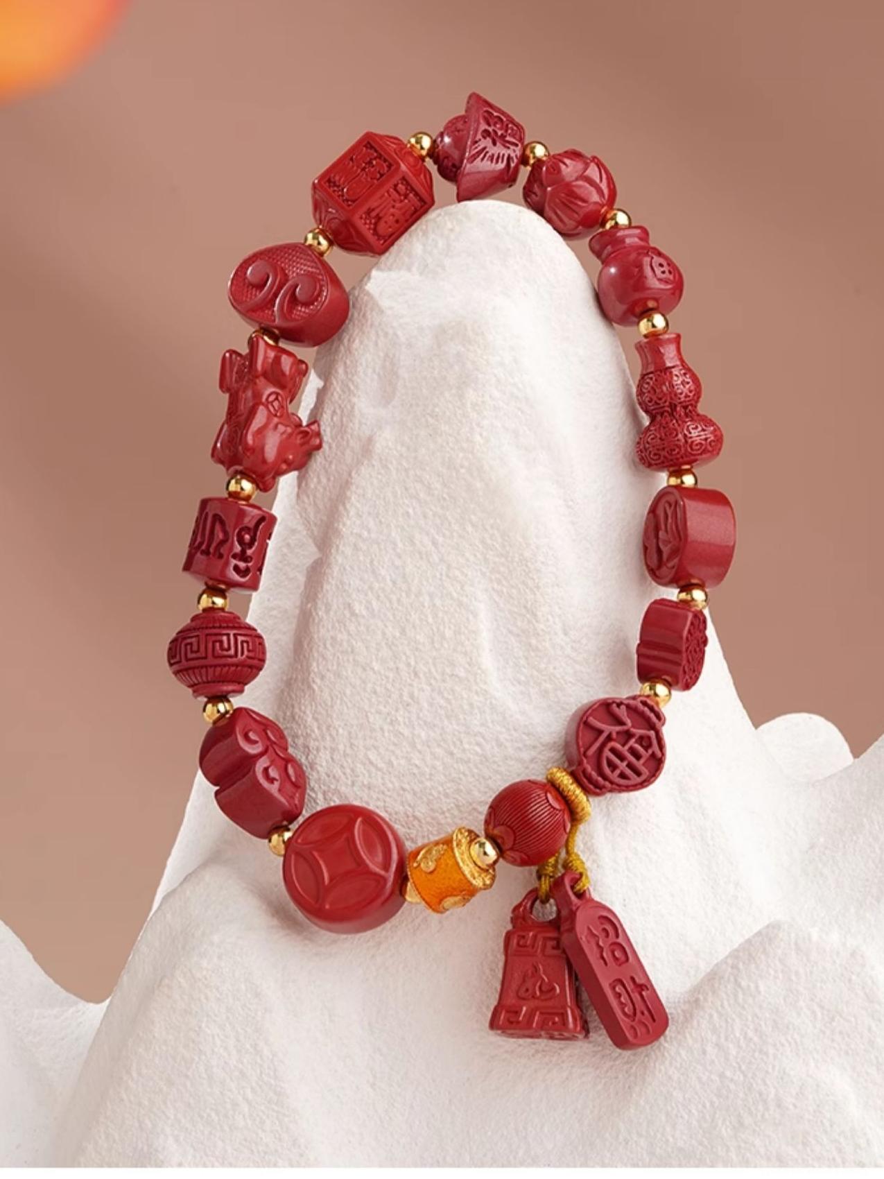 A handcrafted cinnabar bracelet with copper beads, showcasing Tibetan Buddhist jewelry art. This unique piece promotes spiritual harmony and protection.