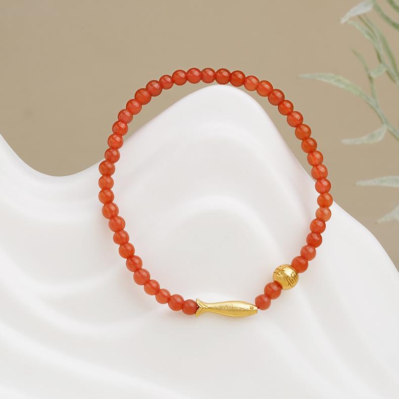 A handcrafted red agate bracelet, showcasing traditional Tibetan designs. The perfect accessory for those seeking spiritual harmony and cultural authenticity.