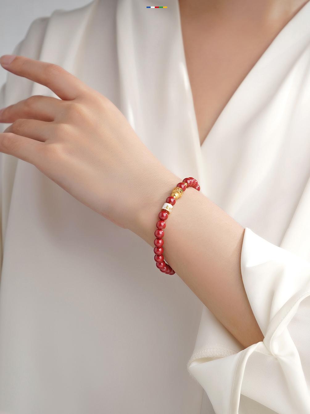 Pure handcrafted cinnabar bracelet symbolizing Tibetan Buddhist blessings, created with sacred jewelry art techniques and cultural aesthetics.