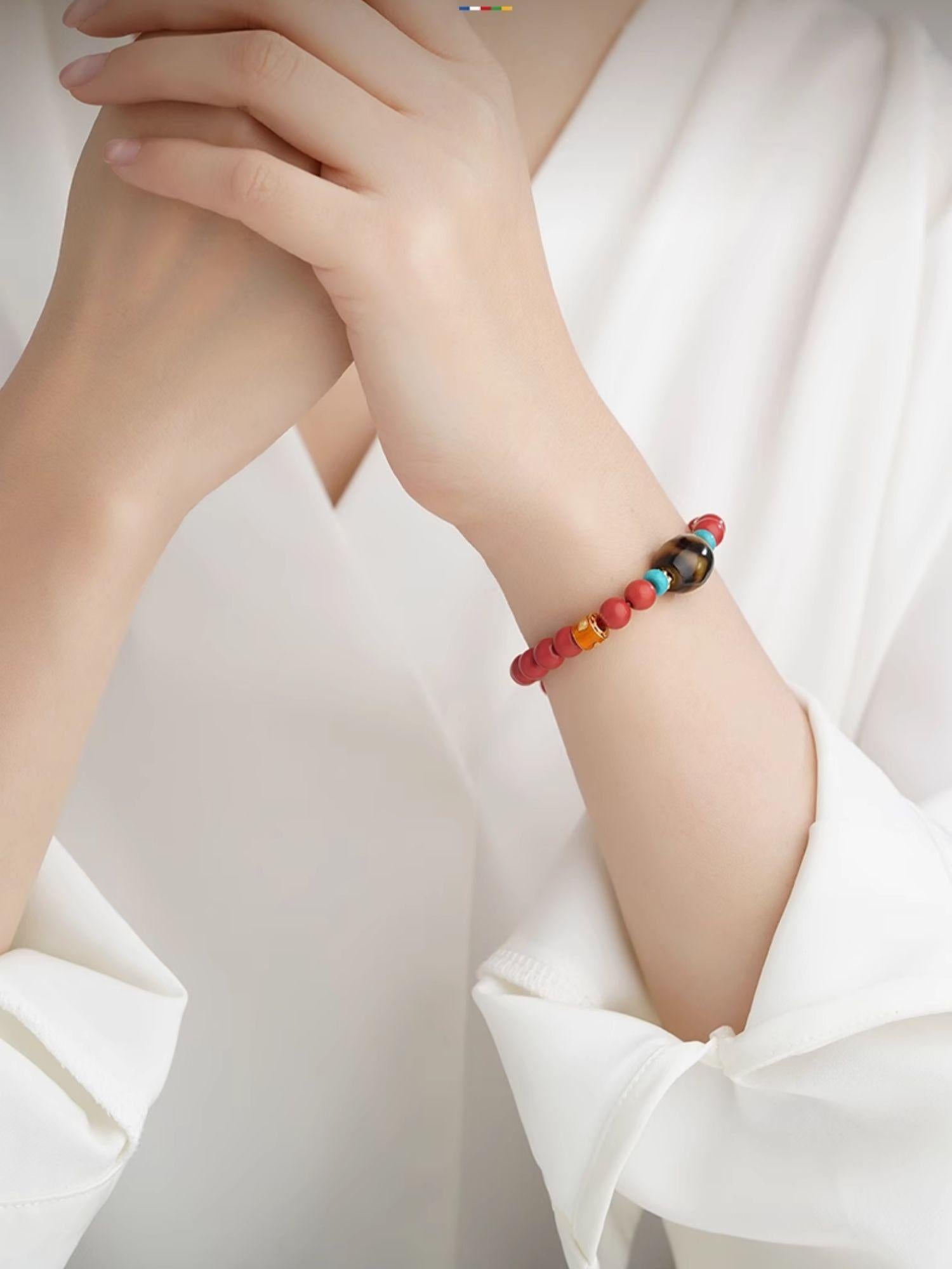 Pure handmade cinnabar bracelet inspired by Tibetan Buddhist spirituality, offering grounding energy, clarity, and traditional jewelry art aesthetics.