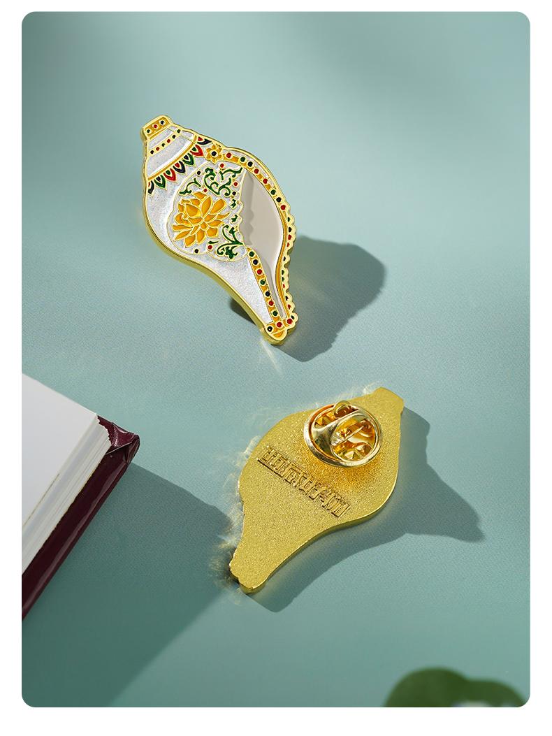 Tibetan Buddhist Jewelry Culture handmade silver amulet pin, fine jewelry art symbol of good fortune and spiritual harmony.