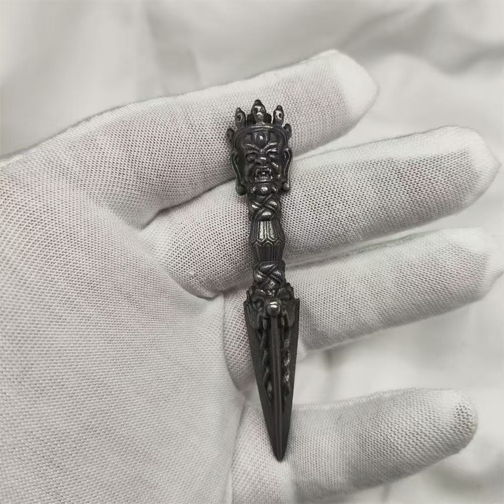 Handcrafted brass Phurba, crafted in Tibetan Buddhist ritual implements culture, used to eliminate negative energy and protect against spiritual obstacles in rituals.