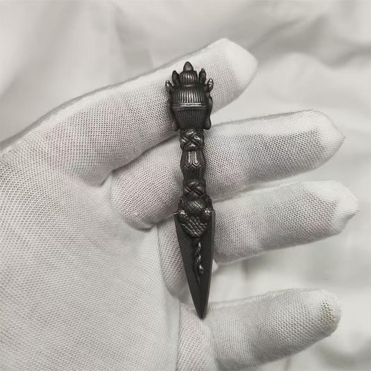 Handmade brass Phurba, symbolizing purification and spiritual transformation, crafted in Tibetan Buddhist ritual implements culture, perfect for spiritual protection.