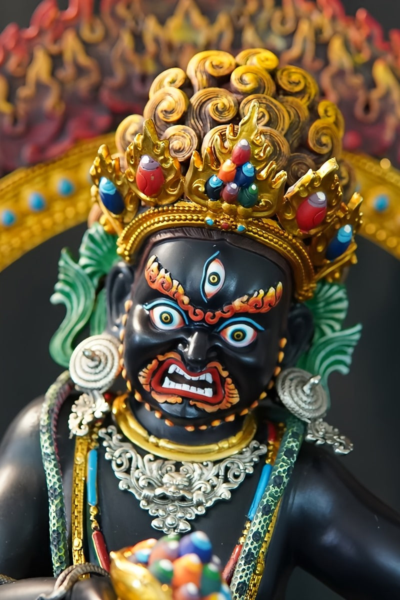 An authentic, entirely handcrafted collectible Black Jambhala statue, crafted from copper and richly detailed with natural mineral paints, embodying sacred Buddhist art.